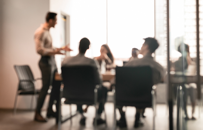 people sitting around a conference table