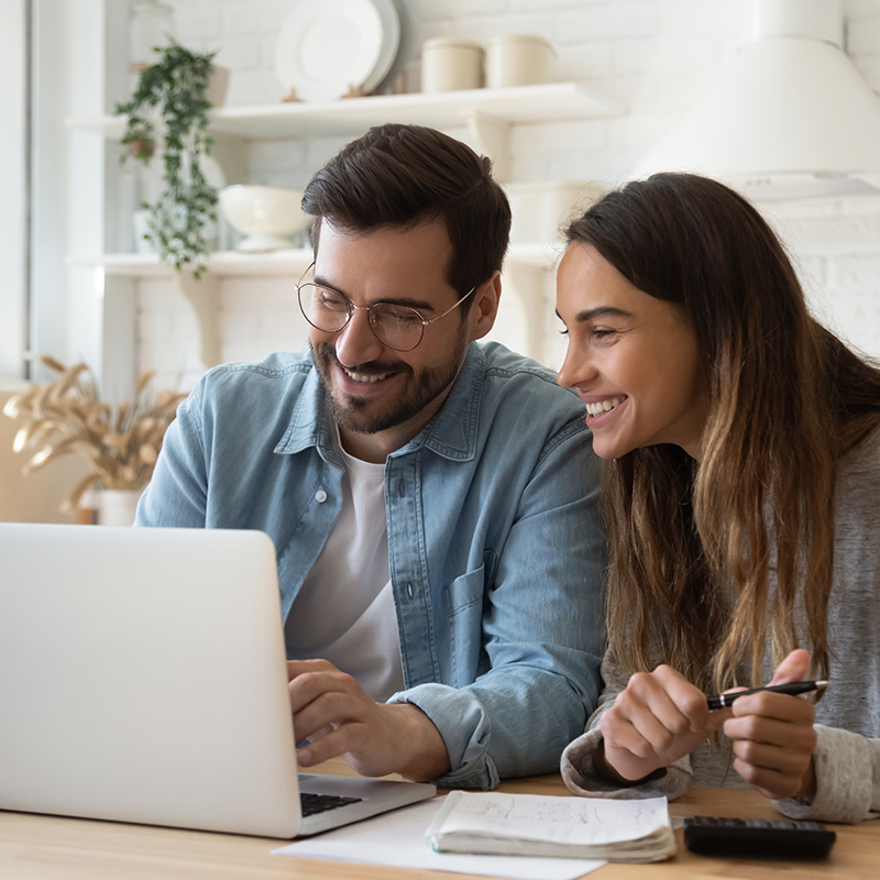 two people looking at a computer